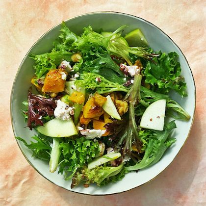 Bitter greens with roasted butternut squash, goat cheese, and maple mustard vinaigrette